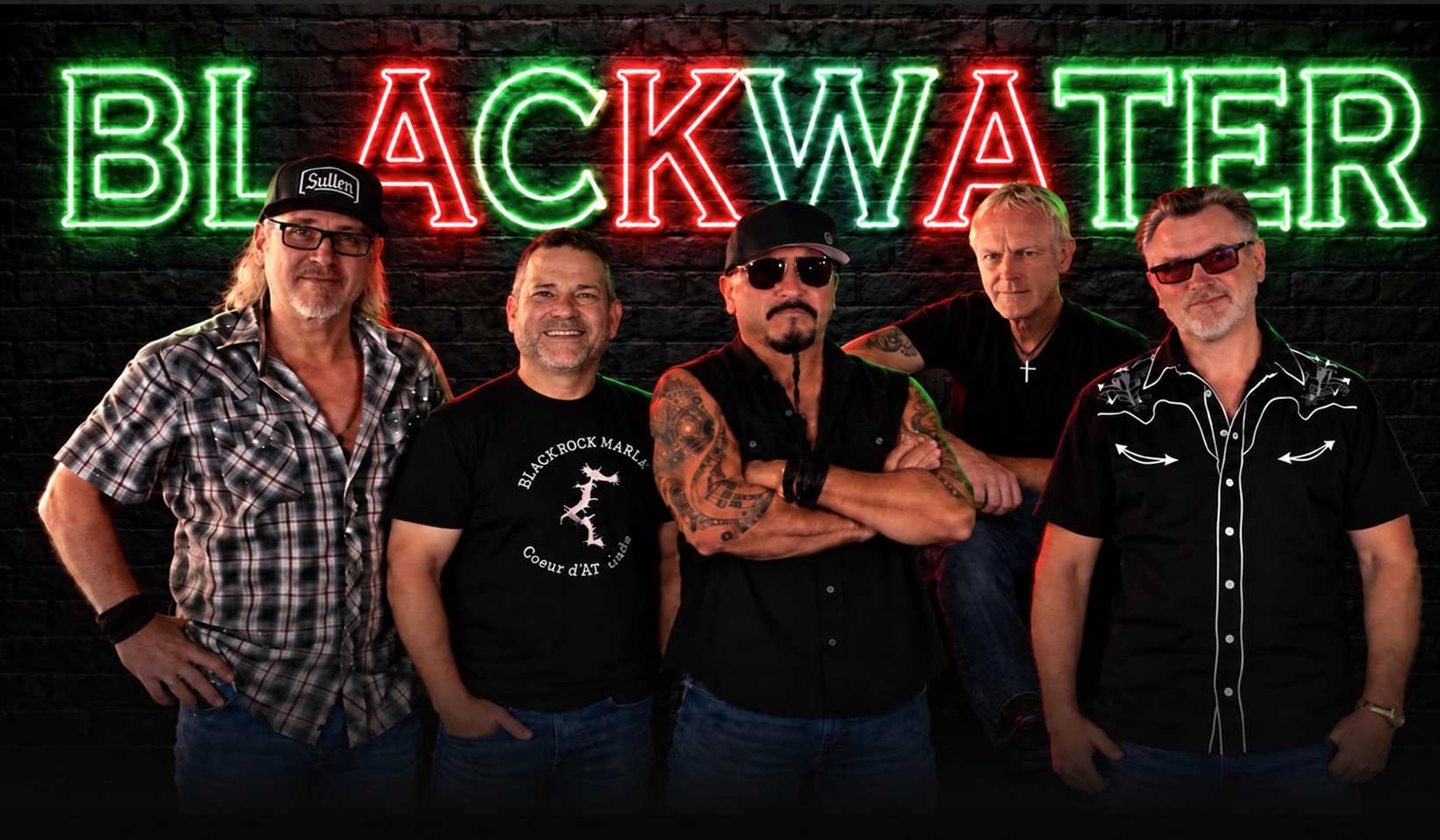 The five members of BlackWater posed beneath the band's red-and-green neon logo
